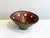 Signed vessel/small bowl by Heidi Kippenberg, designed in a free-form style with a striking combination of white and red...