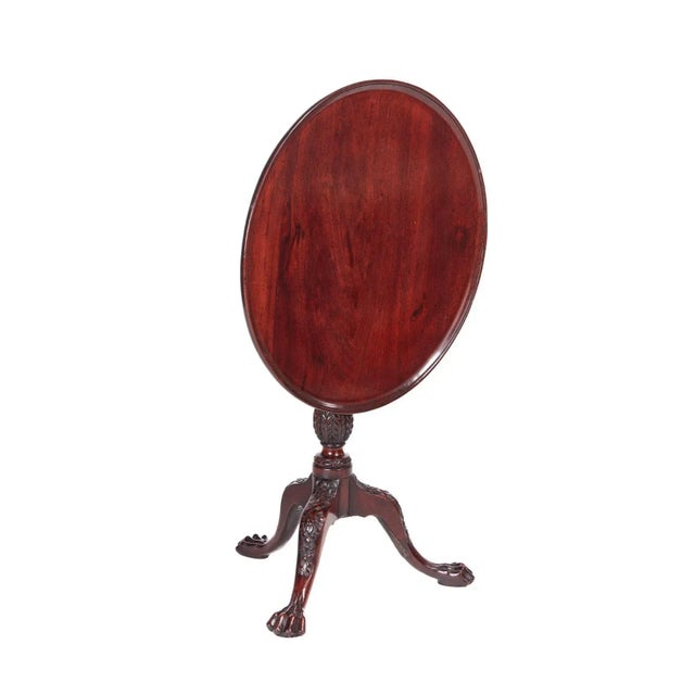 18th Century antique carved mahogany dish top tripod table having a splendid mahogany dish tilt top table supported on a...