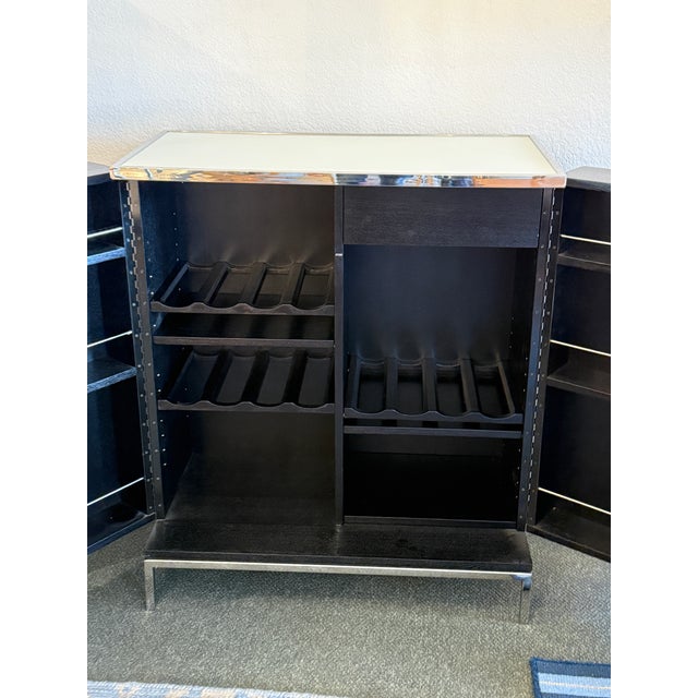 Design Plus Gallery presents the Manning Bar Cabinet from Mitchell Gold & Bob Williams. Dress up your drinks with a modern...