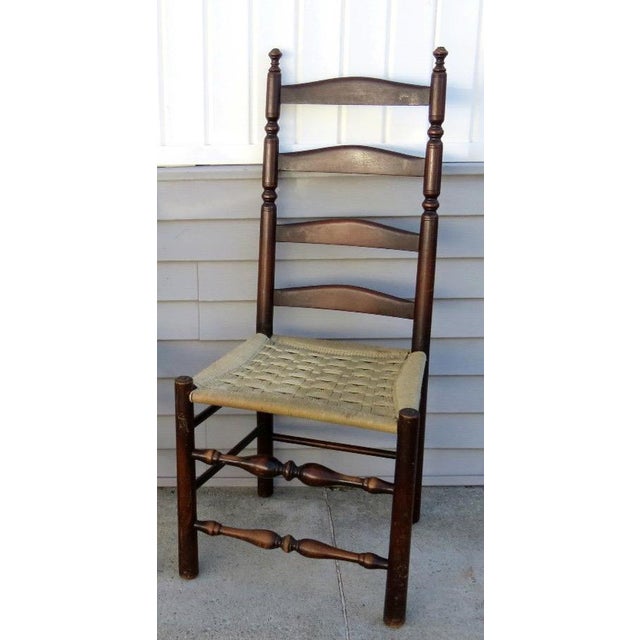 Tall 19th-Century American Primitive Ladderback Chair An exceptional piece of early American folk history, this 43"...