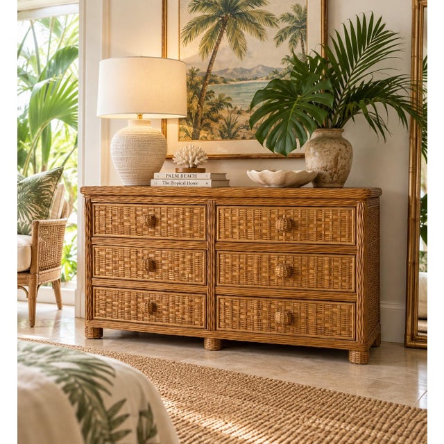 Beautiful vintage six-drawer dresser crafted in woven rattan with a warm natural finish. The dresser features an organic...