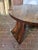 An elegant Art Deco occasional table dating from circa 1930, distinguished by its circular burr walnut top, featuring...