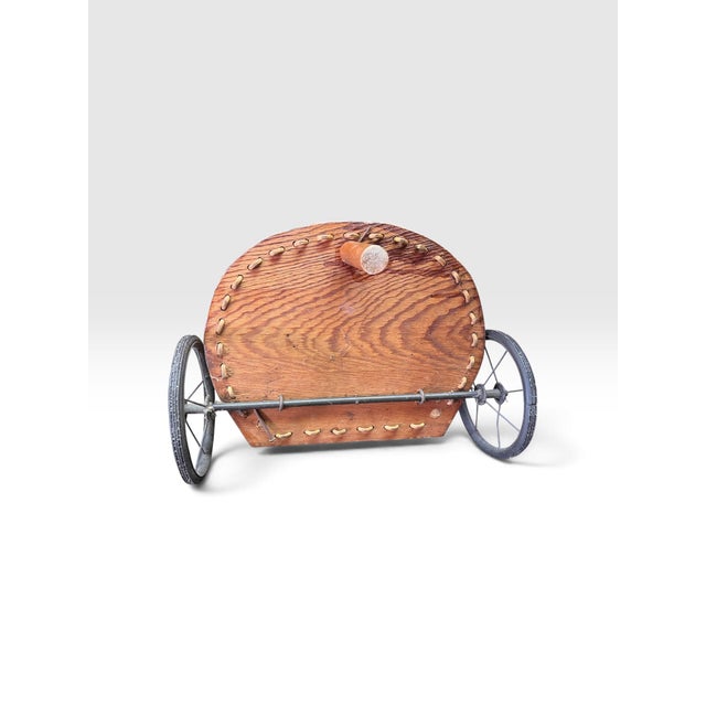 Black Early 20th Century Handwoven Wicker Rolling Market Basket With Iron Wheels For Sale - Image 8 of 9