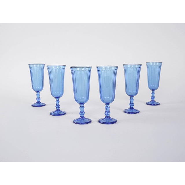 The set of glasses was made in the 1970s in Italy. A set of six glasses made of intense cobalt glass, with a slender bowl...