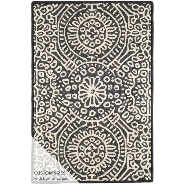 Build a cozy and welcoming sanctuary with this micro-hooked wool rug. Featuring a pattern reminiscent of leaded glass on a...