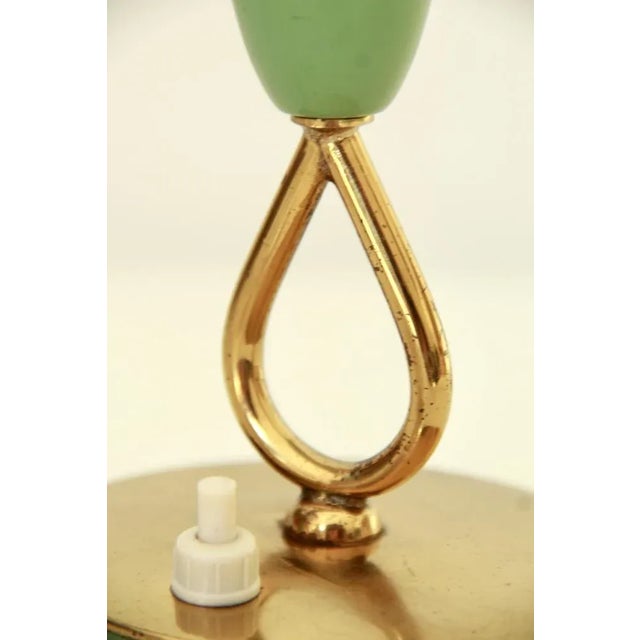 Candelina is a sweet lamp realised in Italy in the late 50s. It shows precious and delicate details such as the brass...