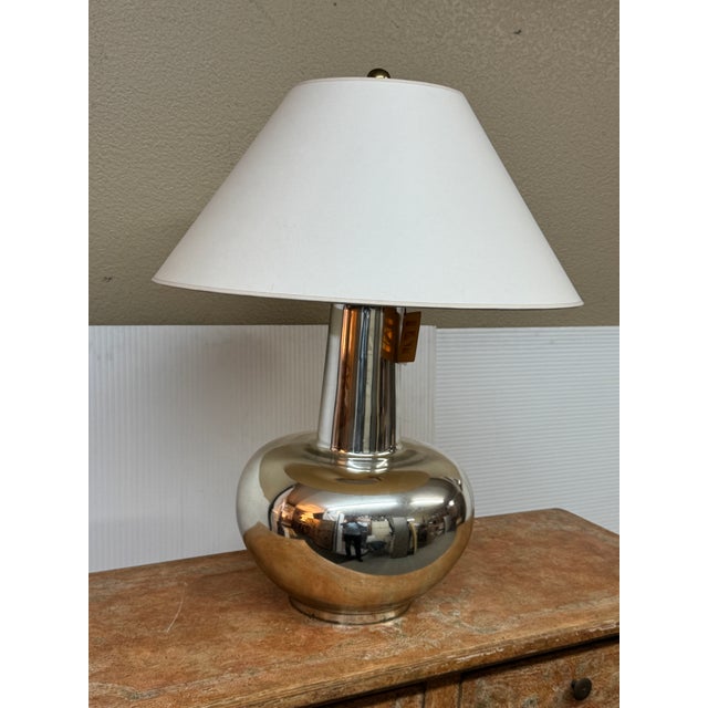 Design Plus Gallery presents a Necked Pot Form Table Lamp by Visual Comfort. The mercury glass body has a rounded base and...