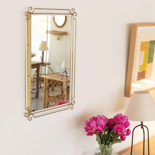 Lovely vintage brass mirror from Italy, 1950s. Brass rectangular frame with loop detail. Original brass finish and mirror...