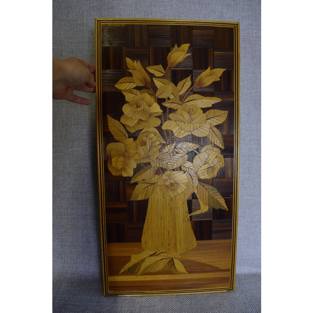 This unique decorative wall panel showcases the intricate craftsmanship of straw marquetry, a traditional and meticulous...