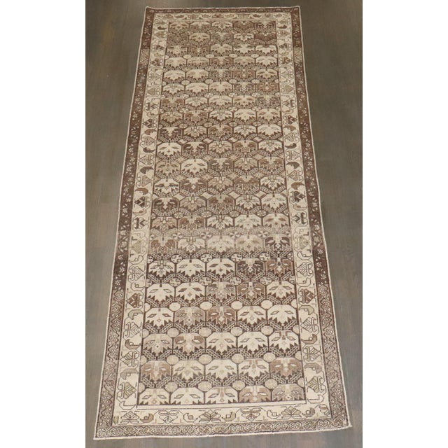 A 2nd quarter of the 20th century Chocolate brown Persian runner