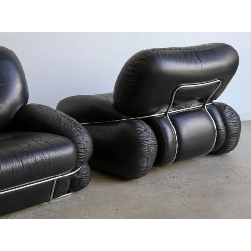 Black leather vintage "Okay Lounge Chairs" by Adriano Piazzesi Size: 33.47 in (85 cm) H x 38.19 in (97 cm) W x 37.8 in (96...