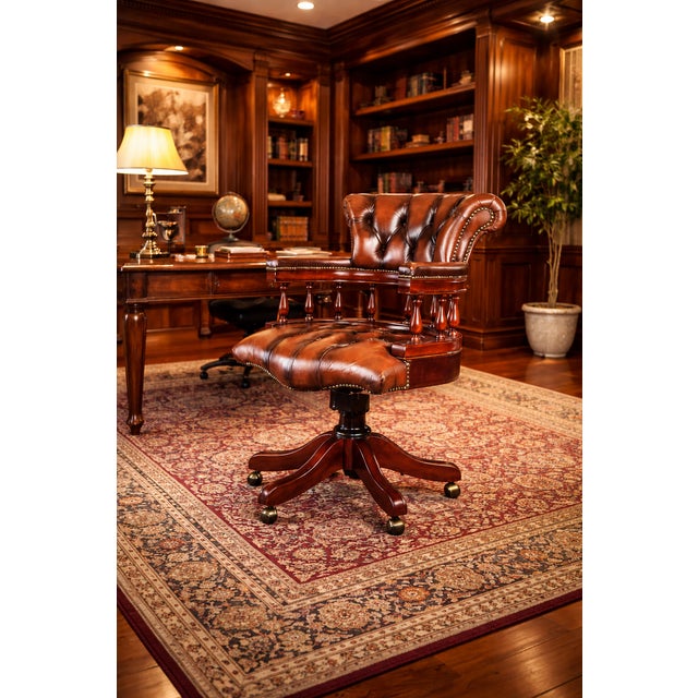 A beautiful expression of old-world elegance and timeless craftsmanship, this exquisite cognac brown genuine leather...