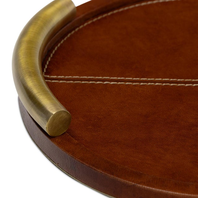 Genuine cognac leather with contrast stitching and plated metal handles is refined luxury. Whether serving cocktails or...