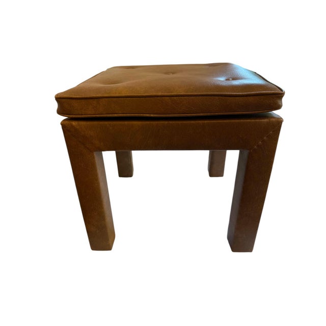 Mid 20th Century Faux Leather Brown Parsons Style Stool This stool is covered in a faux brown leather. There are four...