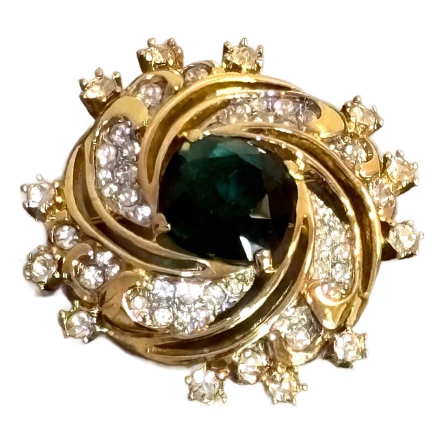 Nina Ricci Gold Tone/Green Rhinestone Swirl Brooch For Sale