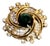 Nina Ricci Gold Tone/Green Rhinestone Swirl Brooch For Sale