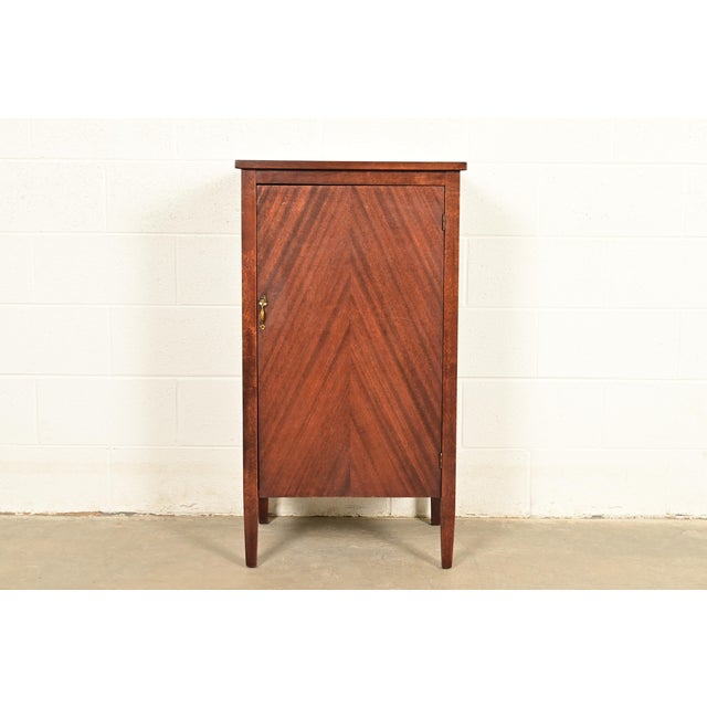 A beautiful antique Arts & Crafts music cabinet or bar cabinet USA, Circa 1900 Mahogany, with original brass hardware....