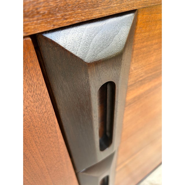 Beautifully stained wood grain! Black stained accents. This vintage piece is quite versatile…credenza…buffet…dresser....