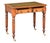 A fine English library table or writing desk of beautiful patinated oak from the William IV period, featuring a moulded...