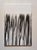 Unimaginable Depths features an intricate interplay of ink on canvas, where fluid strokes cascade downward, creating a...