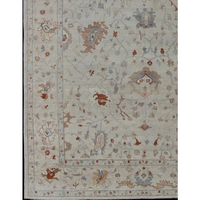 Measures 10'1 x 13'9 Country of Origin: India; Type: Oushak; Design: All-Over, Floral, Oushak Floral; Keivan Woven Arts:...