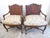 This pair of French 19th Century armchairs have caned seats, carved details, wood backs, silk upholstered down cushions....