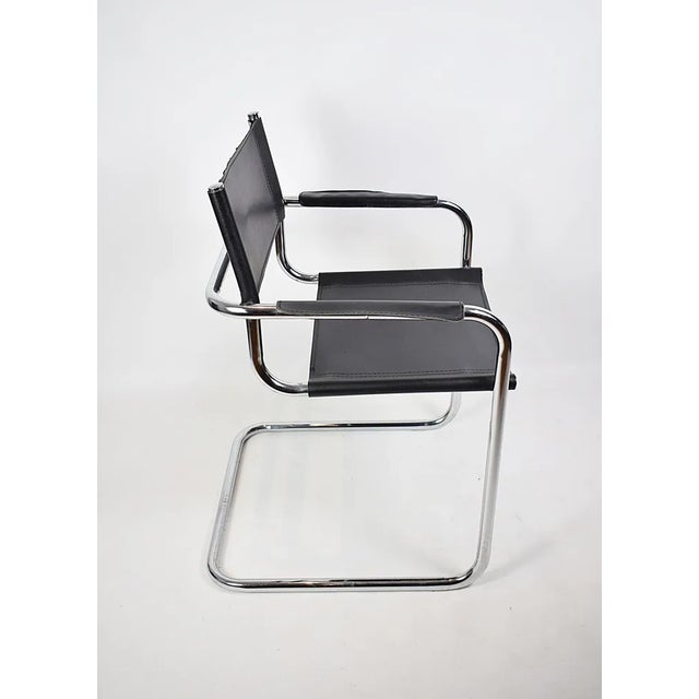 Chair inspired by M. Stam's design, 1980s. Seat and backrest made of ecological leather. Chair made in Italy, in good...