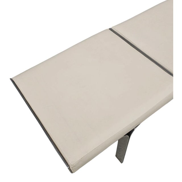 Mid-century modern style bench. It has beautiful tan linen leather padded cushions and a brushed brass finish. Inspired by...