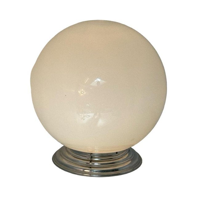 Attributed to Gispen, but not marked. XXL ceiling mounted lamp. made from a metal base and white / opaline glass....
