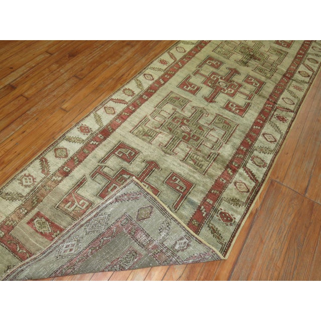 Early 20th century Persian Malayer Kurd runner with Tribal elements that derive from 19th century Persian Bakshaish rugs....