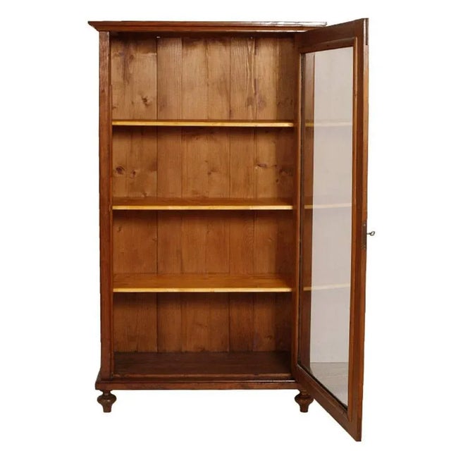 Late 19th century country bookcase display cabinet, with three fir shelves, in solid larch restored and wax polished...