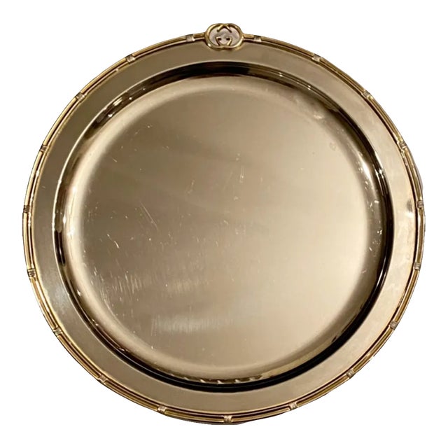 Details: -Vintage Gucci silverplate cocktail serving tray -Tray features Gucci's iconic "GG" logo -Bottom of tray marked...