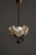 An exceptional 1940s chandelier by Stockmann, model 501-3. Composed of three elegantly arched brass arms, the piece...