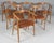 Hans j. Wegner armchairs in massive new renovated soap treated oak new upholstered with black semi aniline leather. Model...