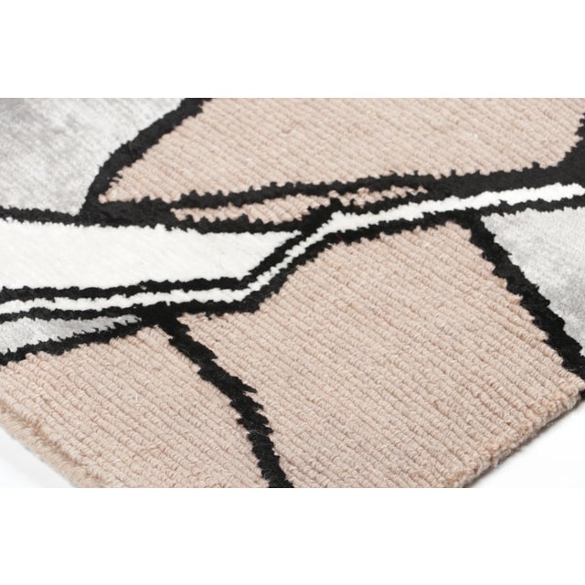 This 2x3 contemporary geometric gift-sized rug is a bold, abstract addition to Rug & Kilim’s Modern collection. Hand-...
