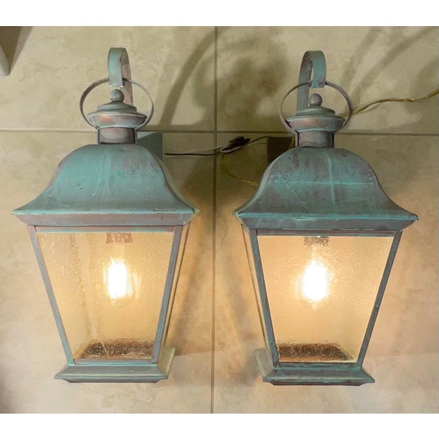 pair of vintage solid brass lanterns exudes timeless elegance and old-world charm. Crafted from , high-quality solid...