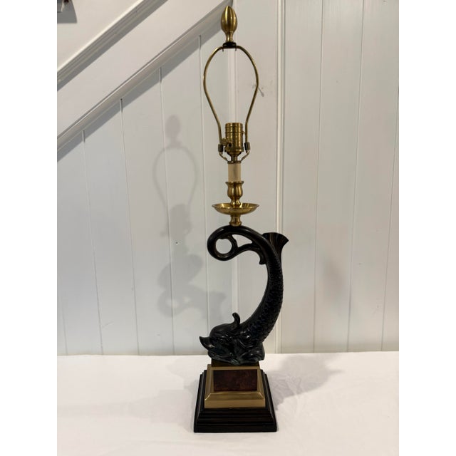 A sculptural vintage Wildwood fish lamp, featuring a beautifully cast bronze-finished fish form with finely detailed...