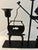 Charming 1980s black metal triple candleholder featuring a cat fishing out of a fishbowl. Excellent condition. Holds three...