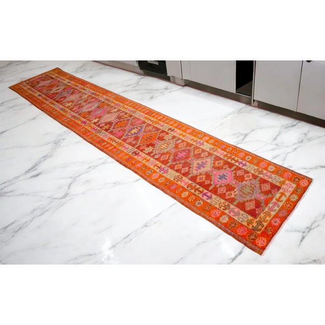 Vintage Turkish runner is from the Kurdish region. This texture, color combination and long size are very difficult to...