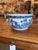 An elegant contemporary Chinoiserie blue and white porcelain centerpiece bowl by the luxury home decor brand Port 68....