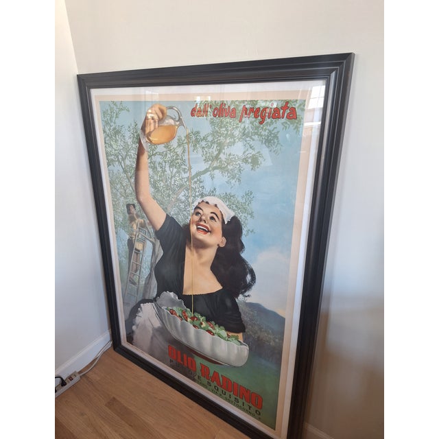 This charming image was created by an Italian illustrator in the 1950’s (c. 1951) to advertise olive oil made by the...
