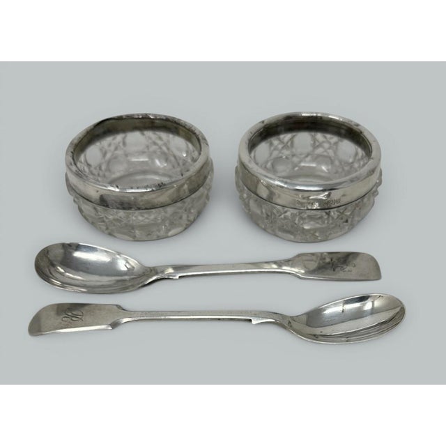 An Exquisite Georgian Style Pair of Sterling Silver Four Section Toast Racks of traditional form retailed by Lowe & Sons...