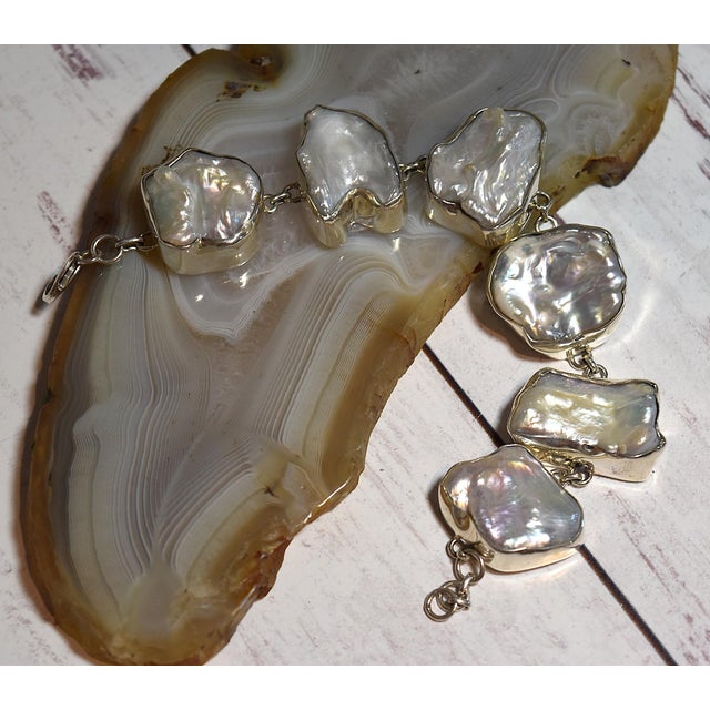 White Freshwater Baroque or Keshi Pearl Sterling Silver Link Bracelet 6 Freshwater White Keshi or Baroque Pearls are set...