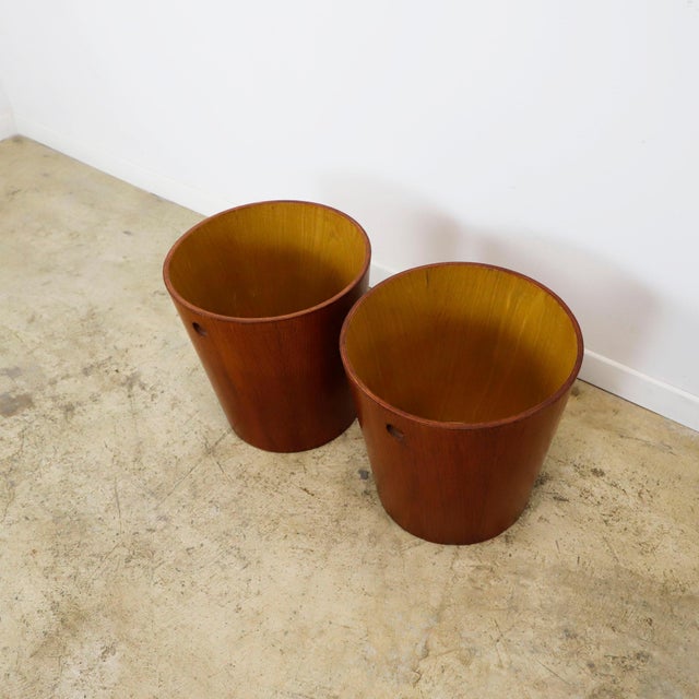 Circa 1960, We offer this Pair of mid century Plywood trash can. Recently restored.