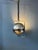 Chrome mid century space age eyeball pendant lamp by GEPO. This playful lamp can turn its shade all around its axis. It...