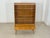 Elegant mid-century display cabinet from the 1960s. This piece of furniture impresses with its simple, period-typical...