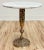 Classic vintage French style brass filigree base table with round marble top. Marble top features gorgeous veining....