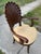 Mid-20th Century Italian Venetian-style grotto armchair, featuring a hand-carved shell-shaped backrest and a neutral beige...