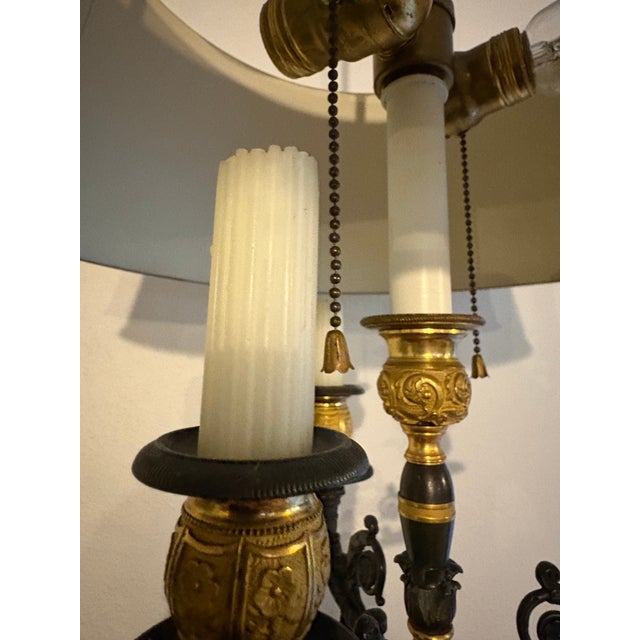 Fabulous French neo classic bronze and gilt lamp intricate details. 2 bulb pull chain design. Metal tole shade has...