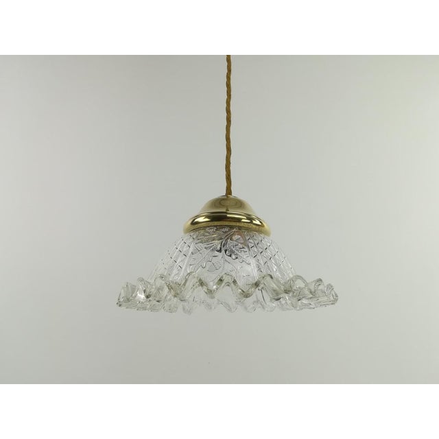 Beautiful old shade in a perfect condition with floral motif and equally attractive brass umbrella holder from the 1910s....